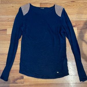 Blue top with suede shoulders pads